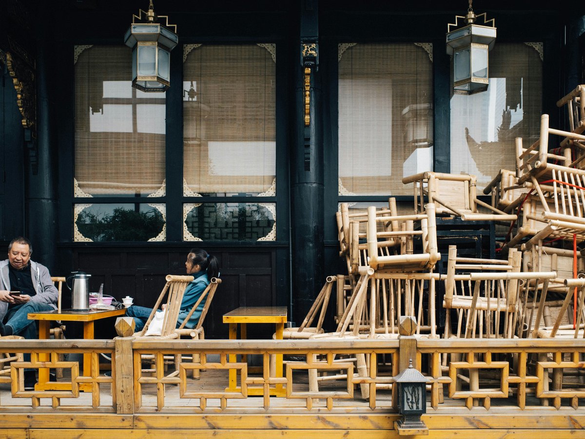 brown wooden chairs and tables