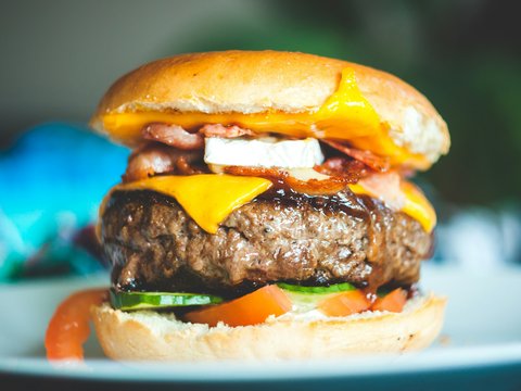 close-up photography of burger with patty and slice cheese