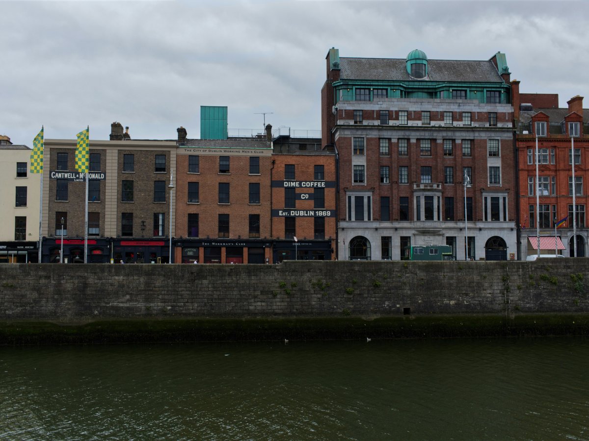 a body of water with buildings along it