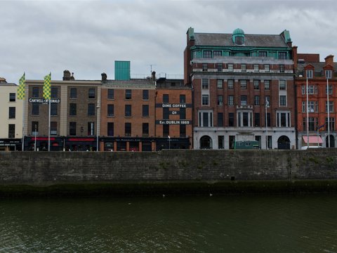 a body of water with buildings along it