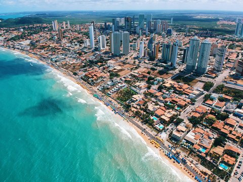aerial photography of city building near the seashore during daytime