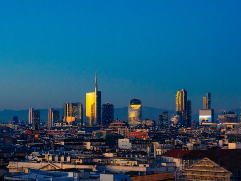 a view of a city at night from the top of a building