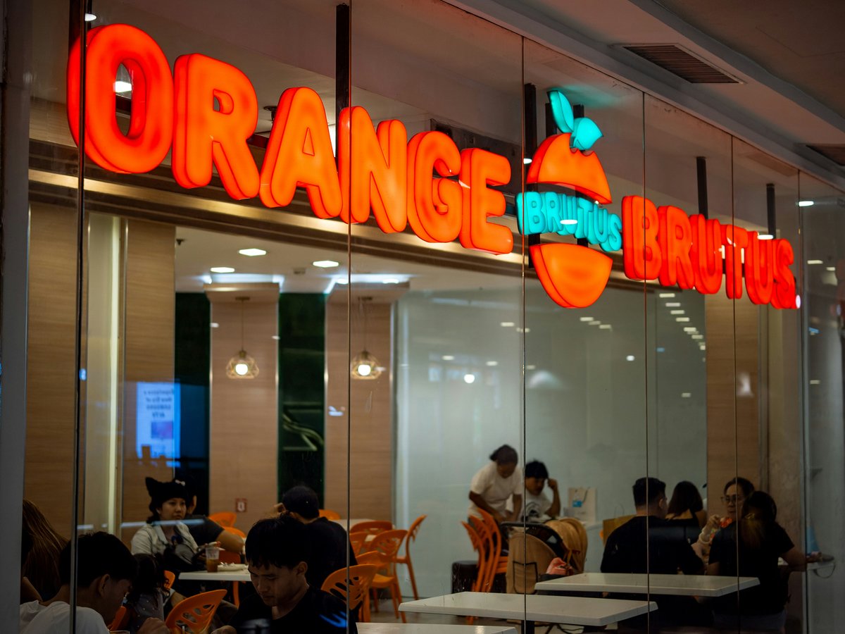 Orange julius store interior with customers