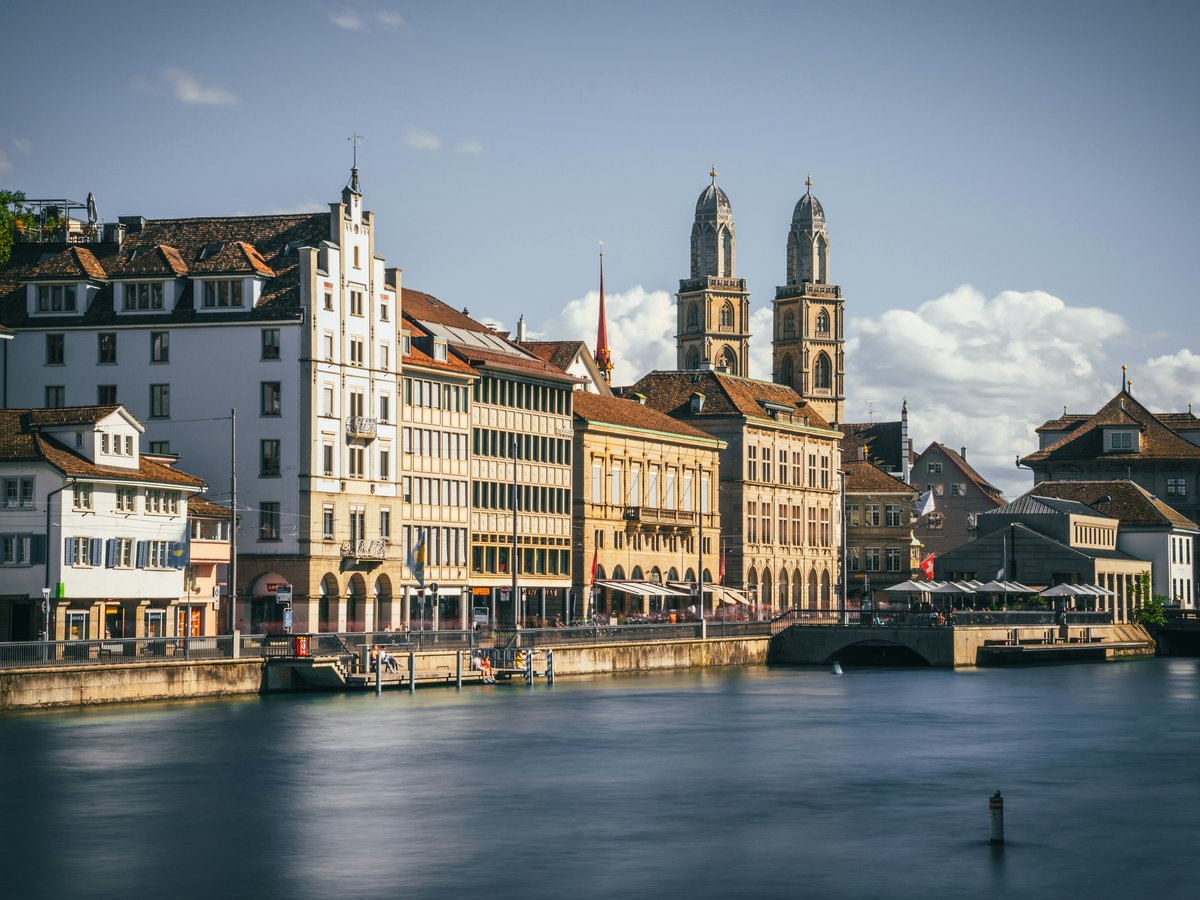 a body of water with buildings along it