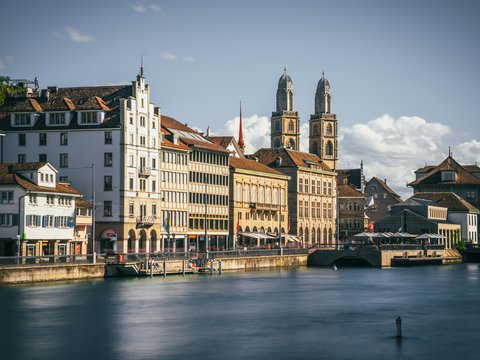 a body of water with buildings along it