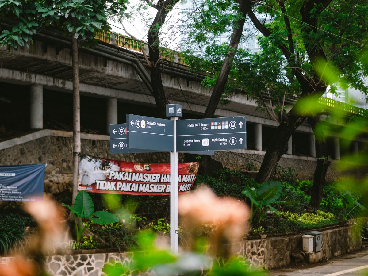 a street sign in front of a building