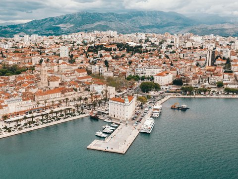aerial view of building near body of water