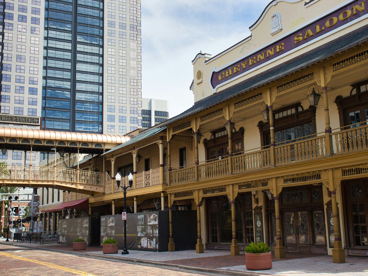 Old western style building next to modern skyscraper