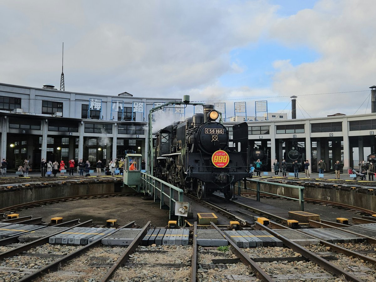 a train on a train track in a train station