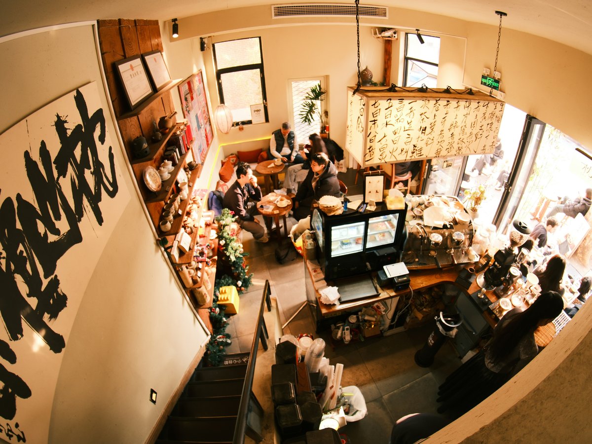 A busy restaurant filled with people.