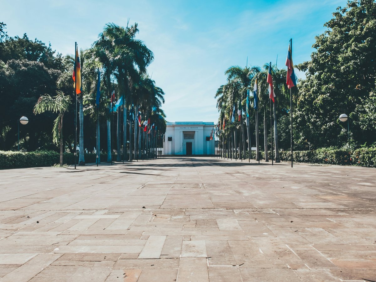 a building with a lot of flags in front of it