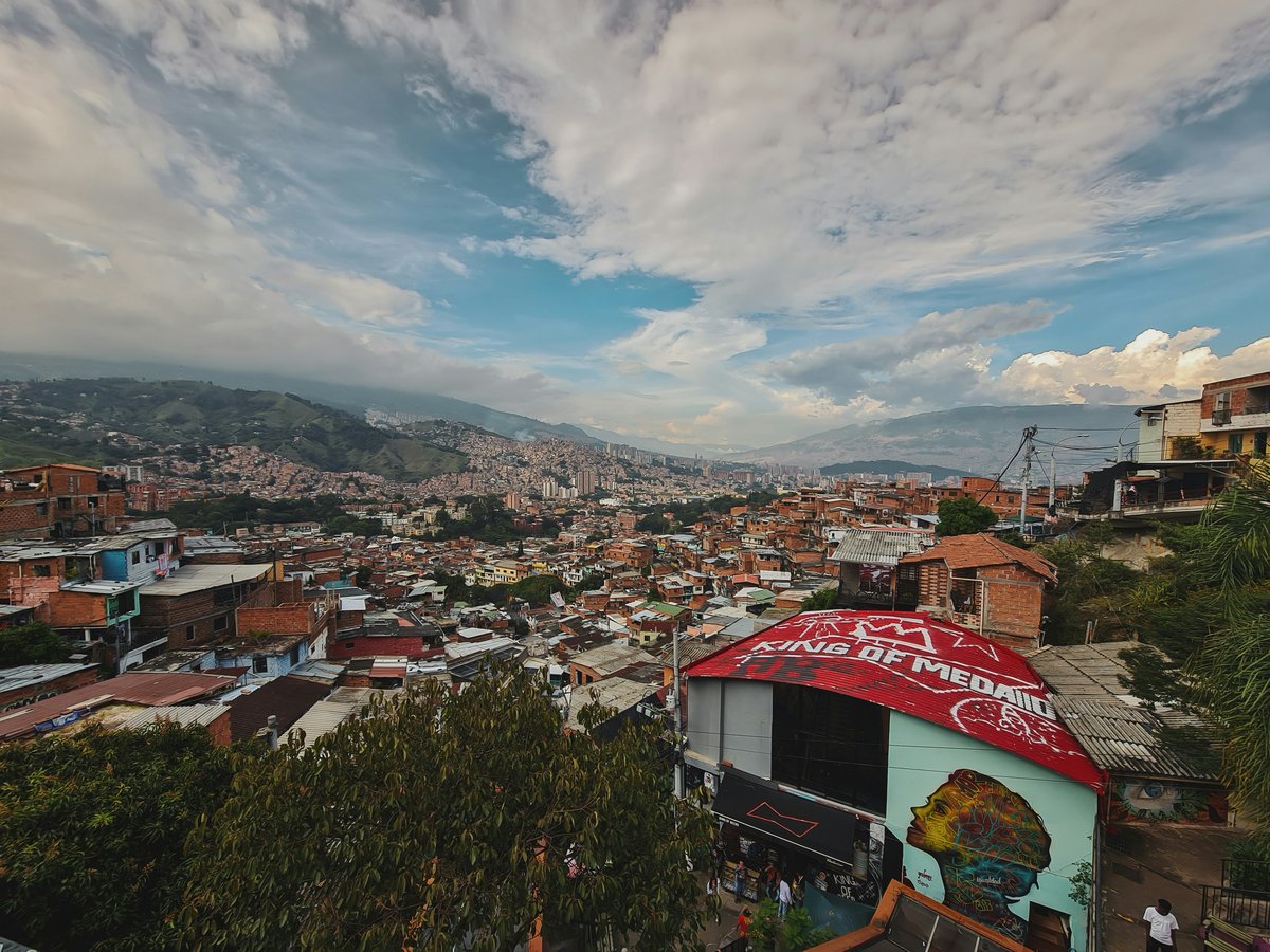 a view of a city from a hill