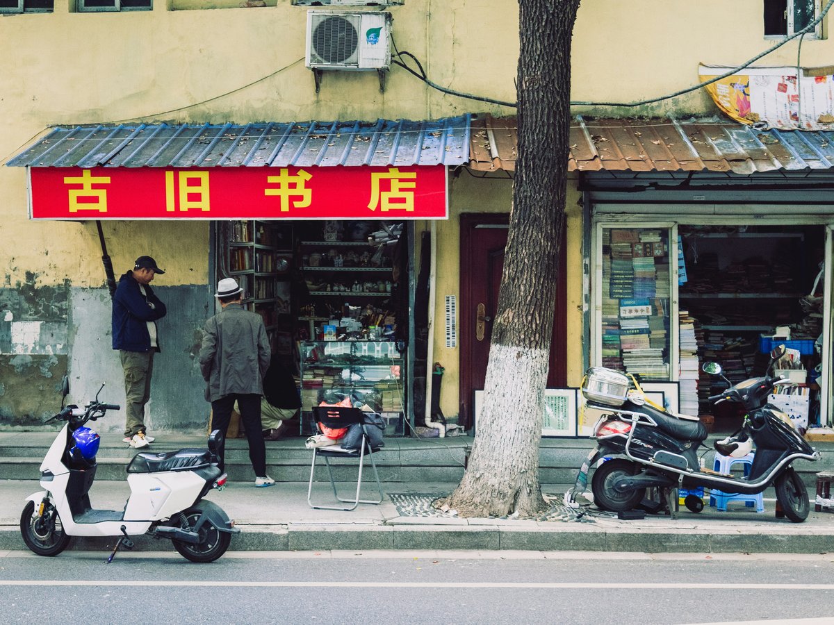 A motorcycle parked on the side of a street