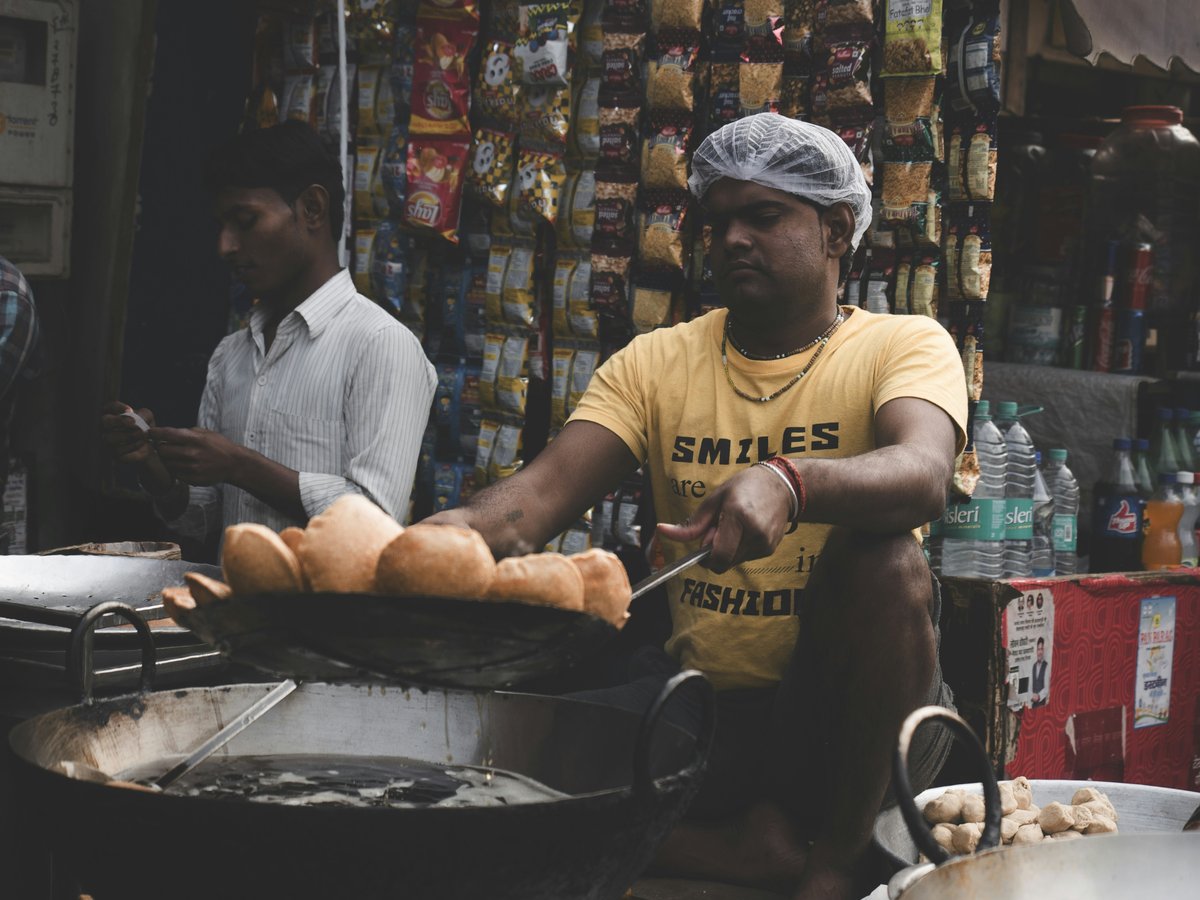 man holding cooking pat