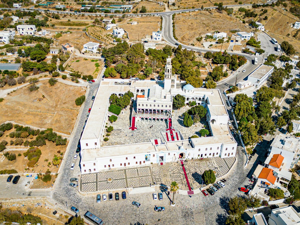 An aerial view of a large white building