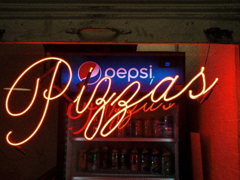 lighted pizzas neon light signage