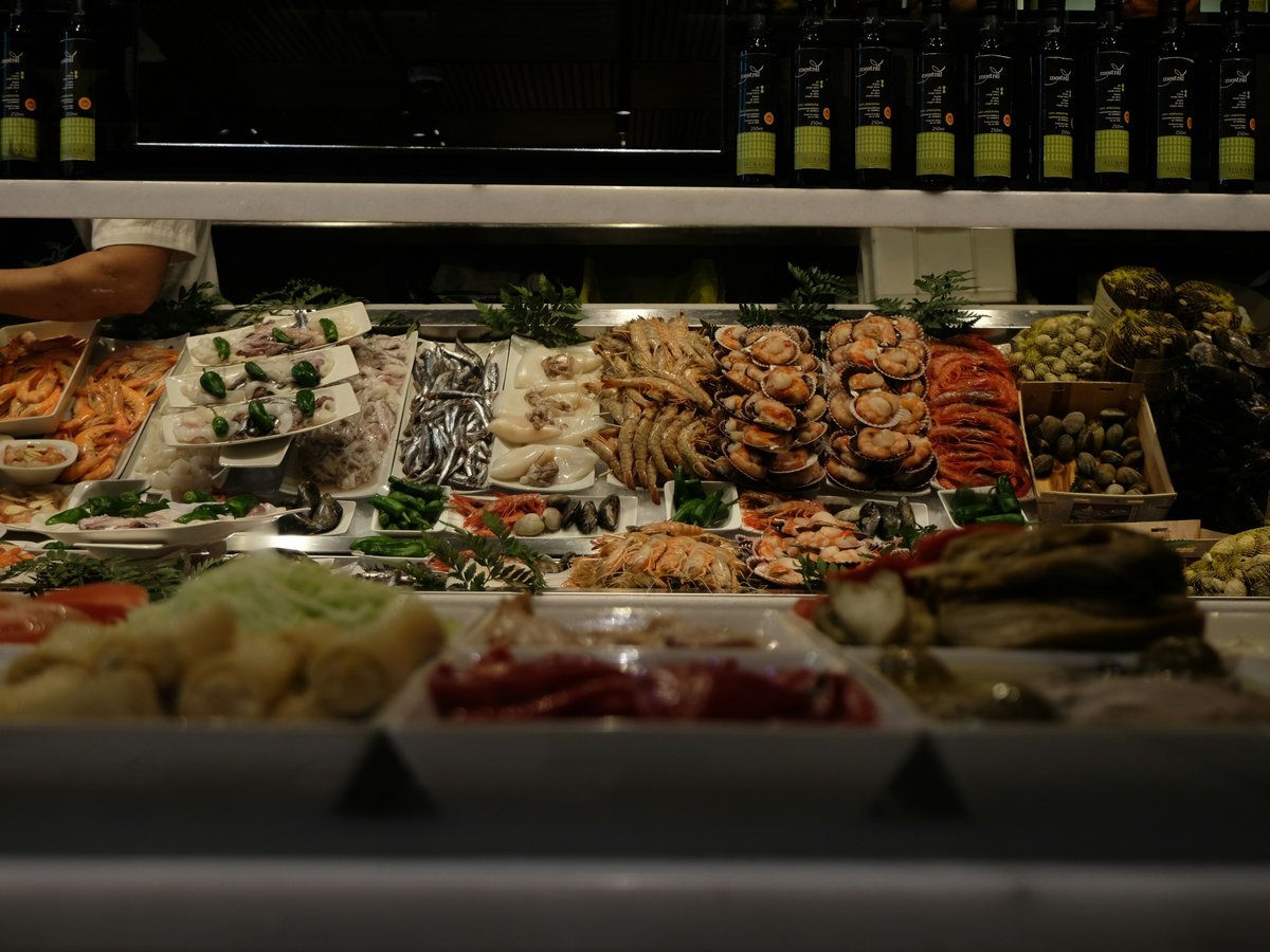 a display case filled with lots of different types of food
