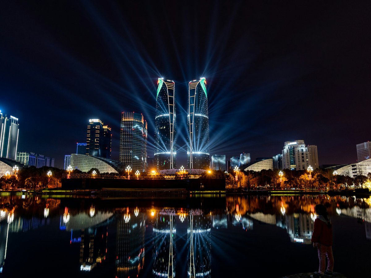 city skyline during night time