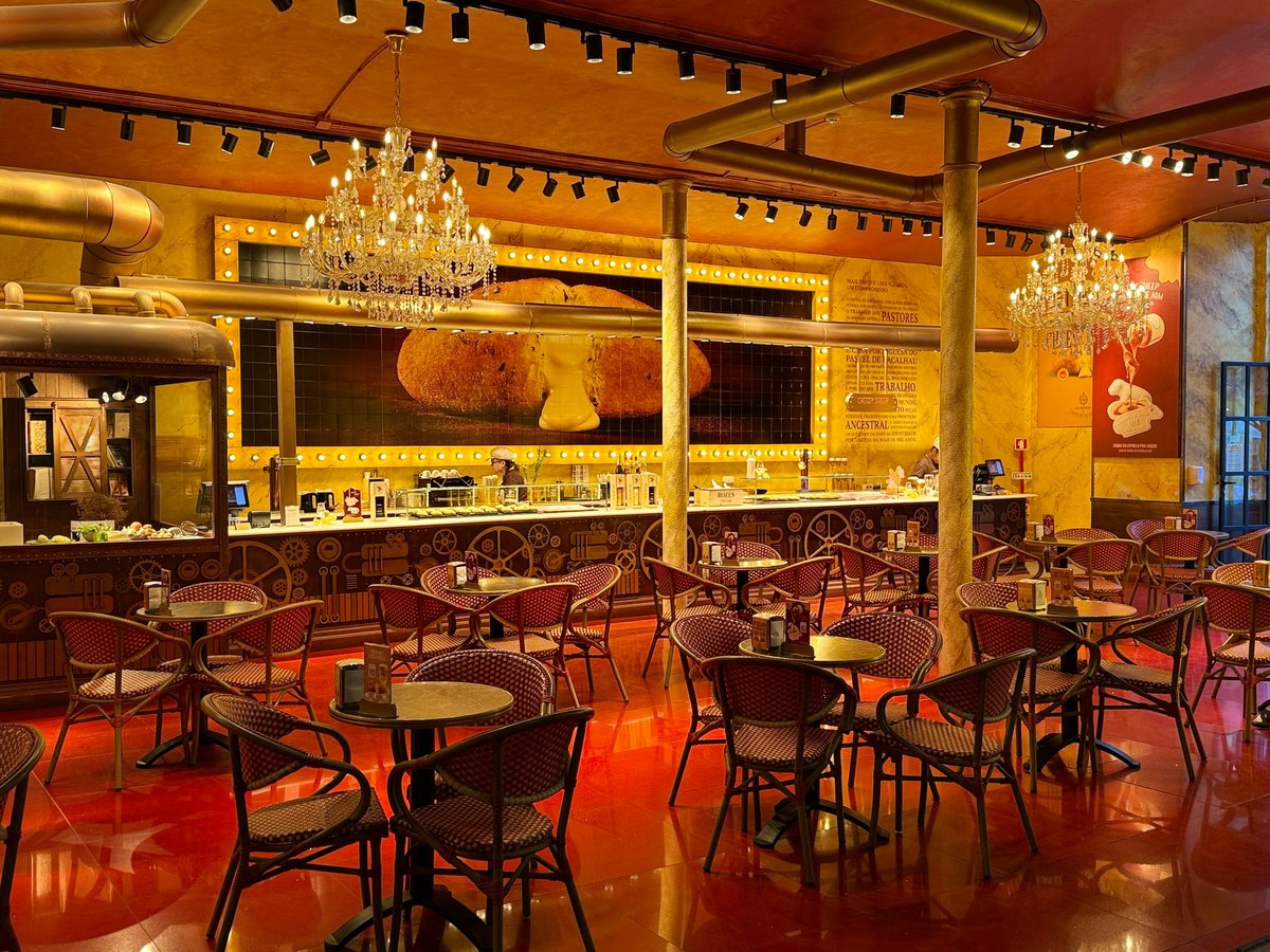 Elegant restaurant interior with tables and chandeliers