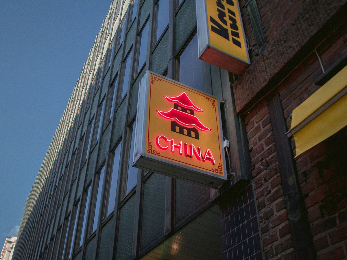 red and yellow China signage near building