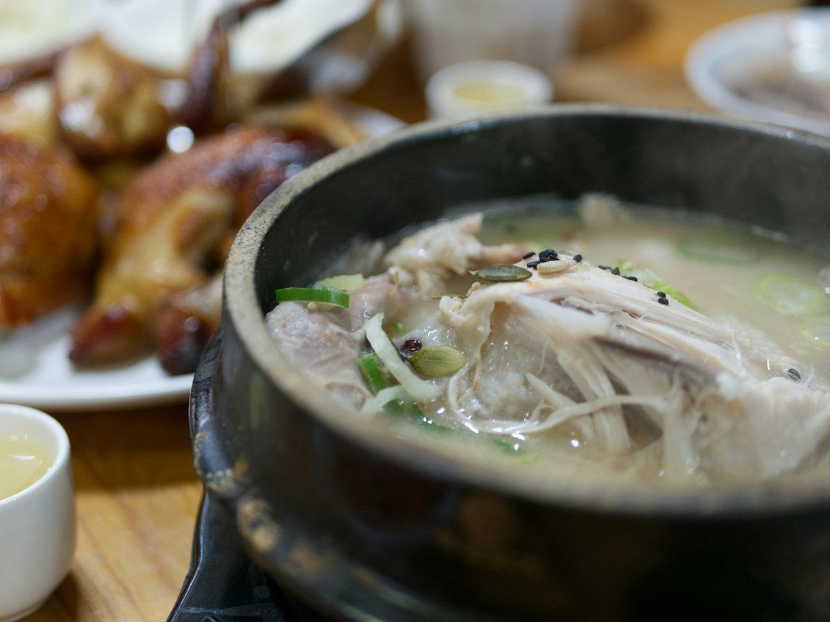 white soup on black ceramic pot