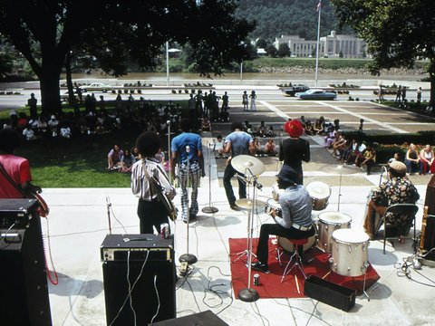 a group of people playing instruments