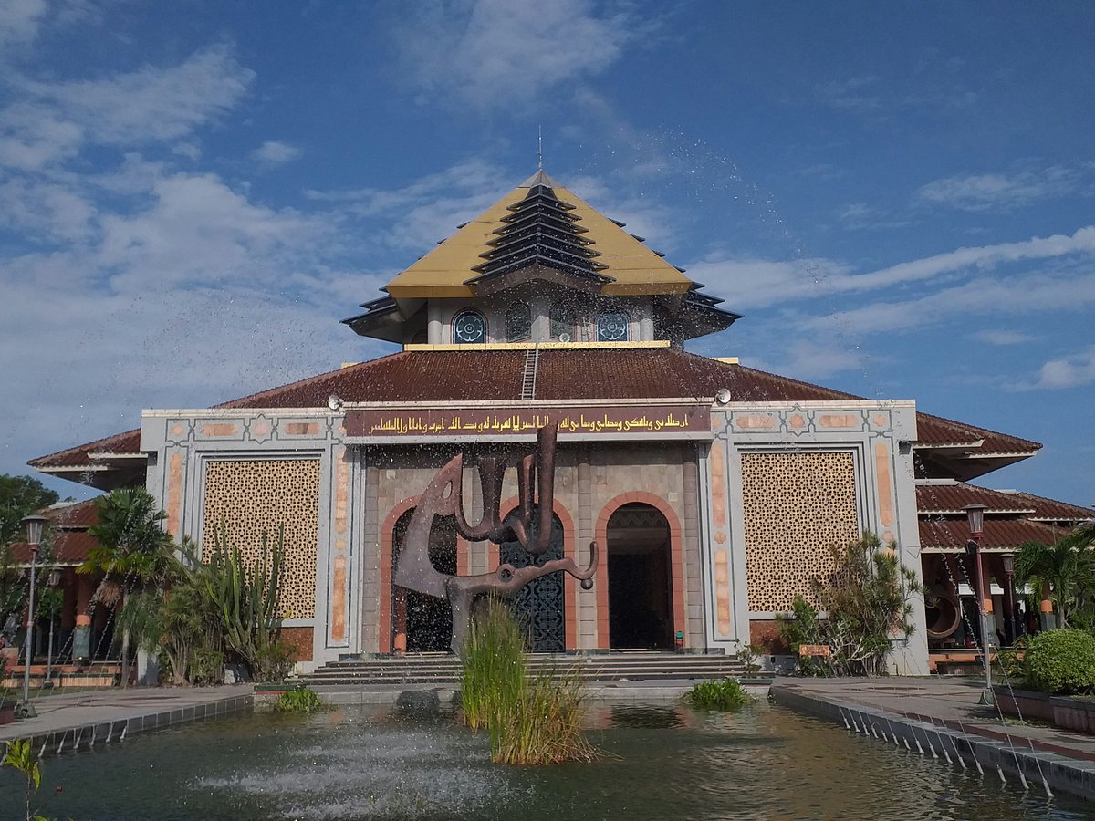 a building with a fountain in front of it