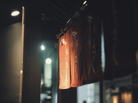 a dark room with a light on the ceiling