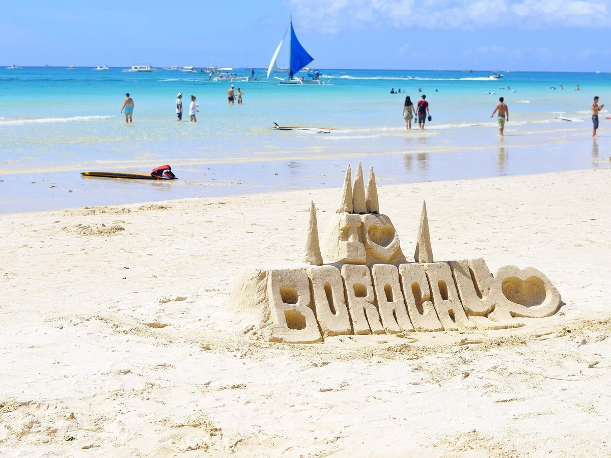 people walking on Boracay beach
