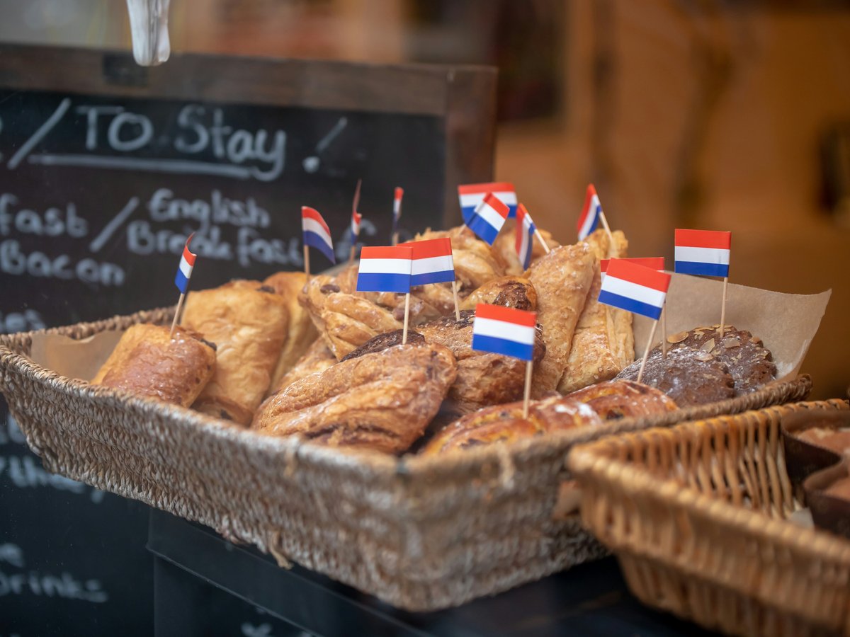 baked pastries on brown wicker basket