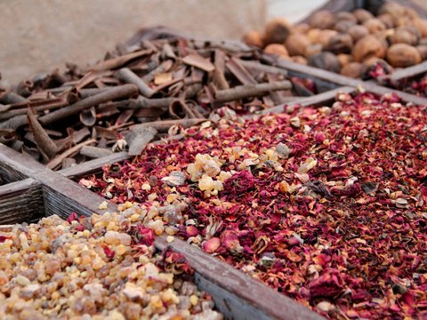 variety of spices on wooden crates