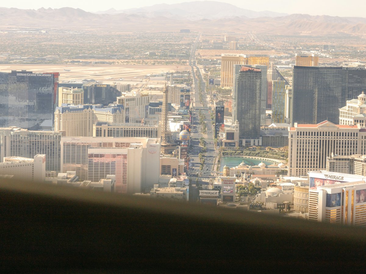 A view of a city with mountains in the background