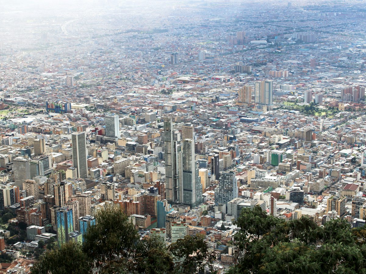 A view of a city from the top of a hill
