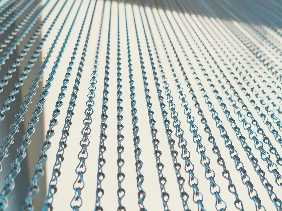 a close up of a chain link fence