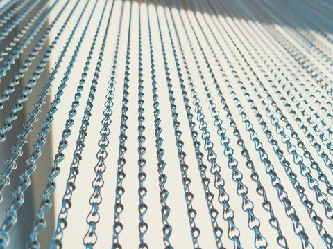 a close up of a chain link fence