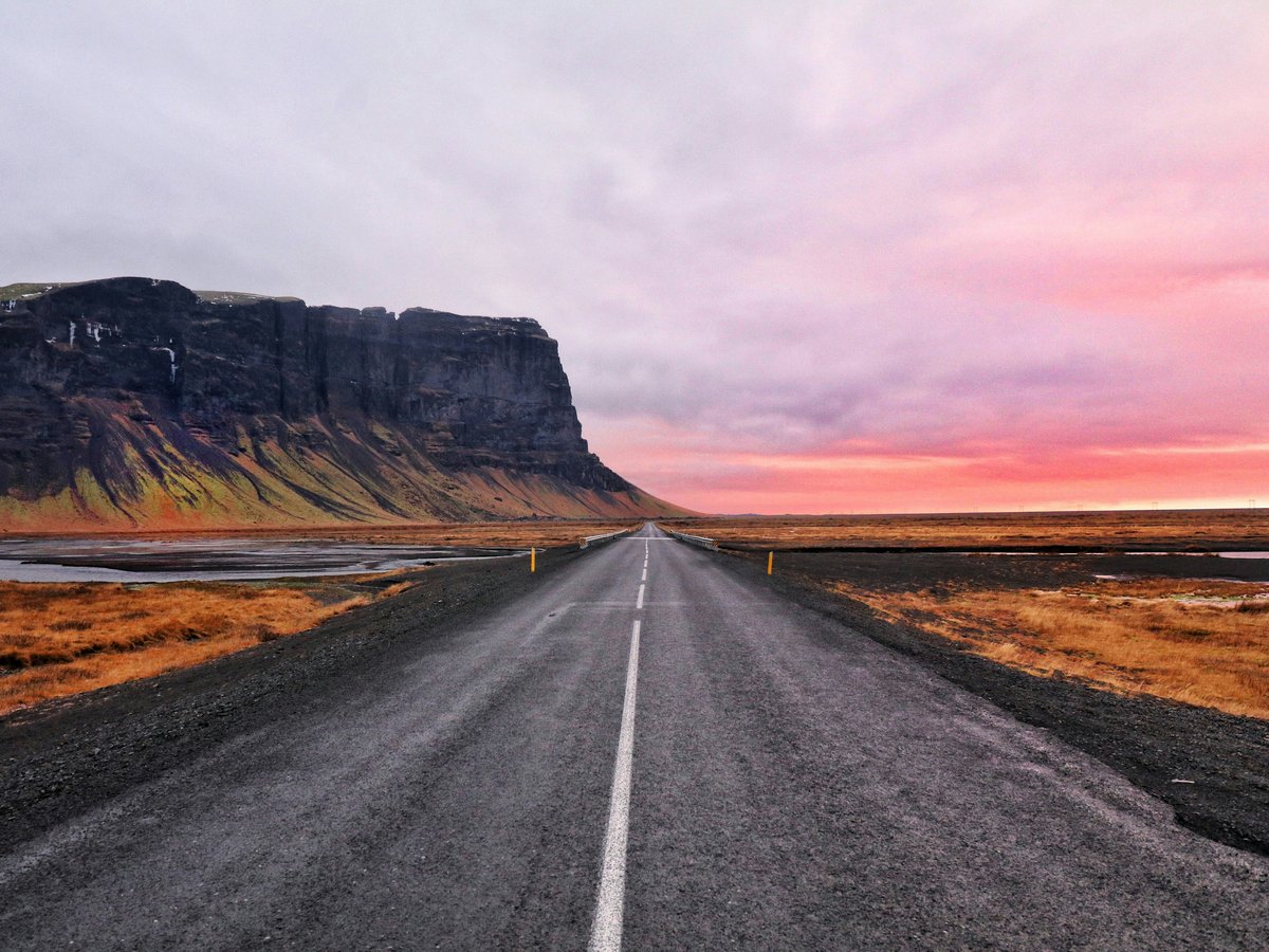 asphalt road and cliff horizon
