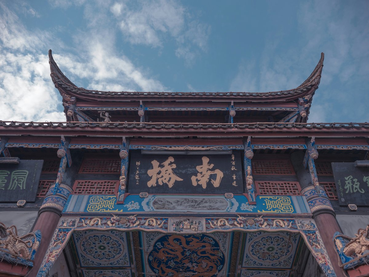 blue and brown wooden building under blue sky during daytime
