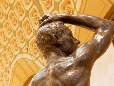 low angle photo of man's statue