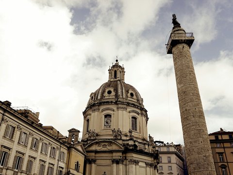 a tall tower with a clock on the top of it