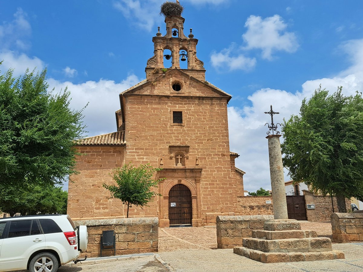 a car parked in front of a church