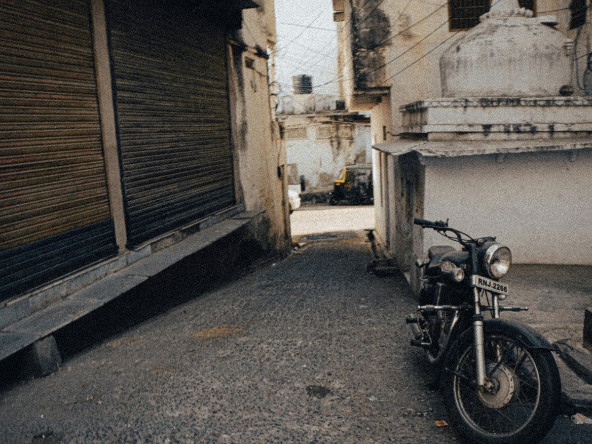 a motorcycle parked on the side of a street