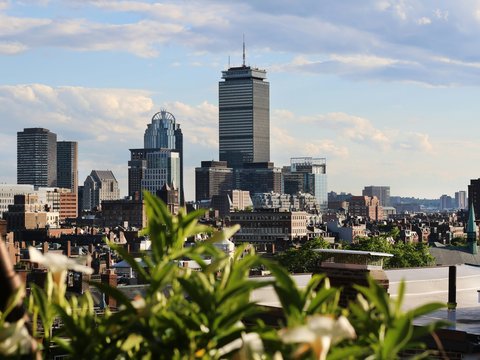 city skyline under blue sky during daytime