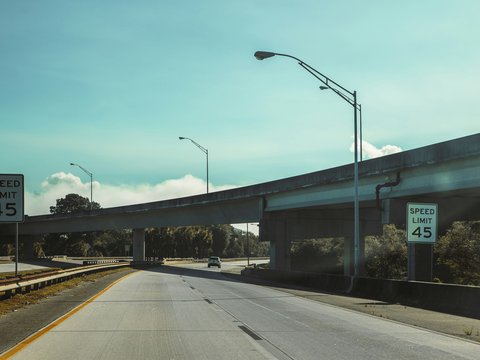 a road with a bridge over it