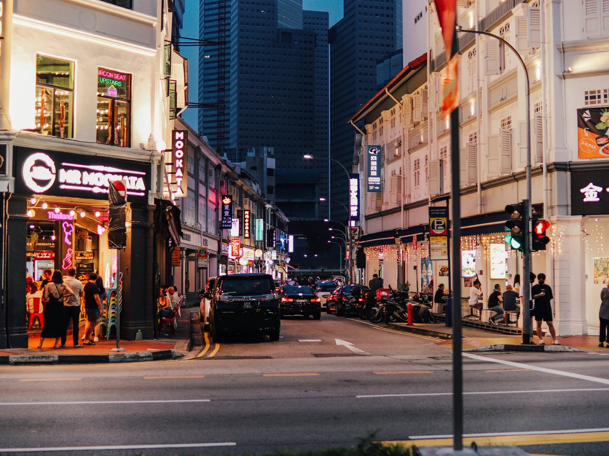a city street filled with lots of tall buildings