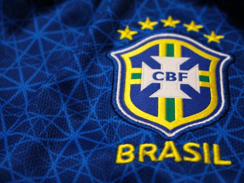 a close up of the logo on a soccer jersey