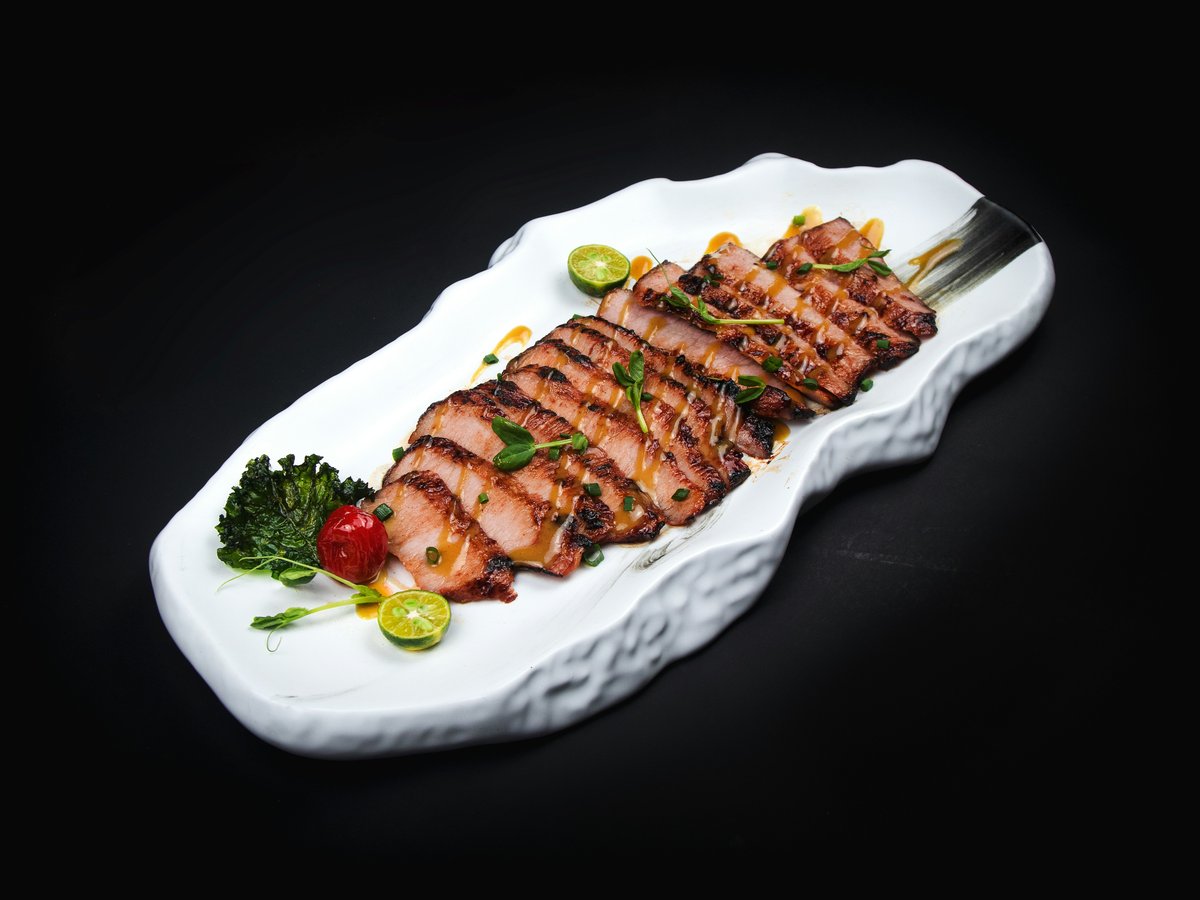 grilled meat on white ceramic plate