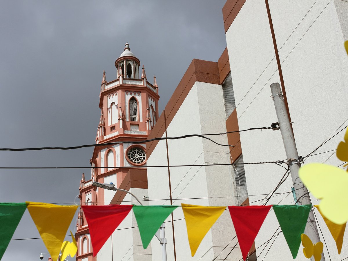 A building with a clock tower in the background