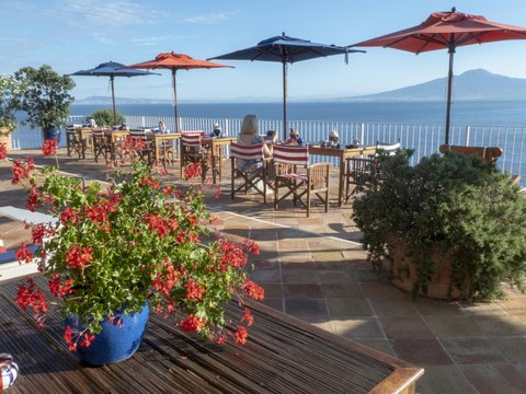 two blue and red patio umbrellas