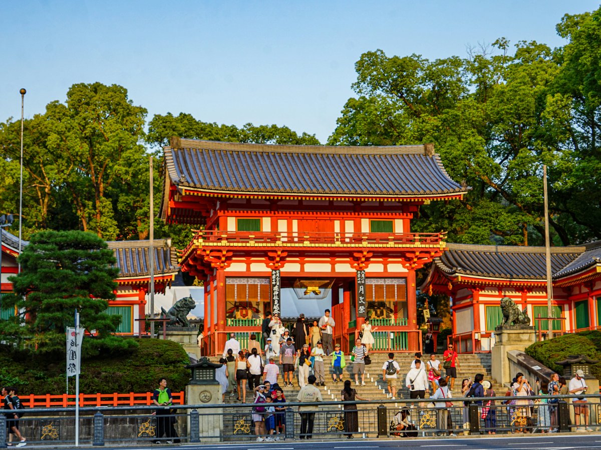Traditional japanese temple gate with surrounding greenery