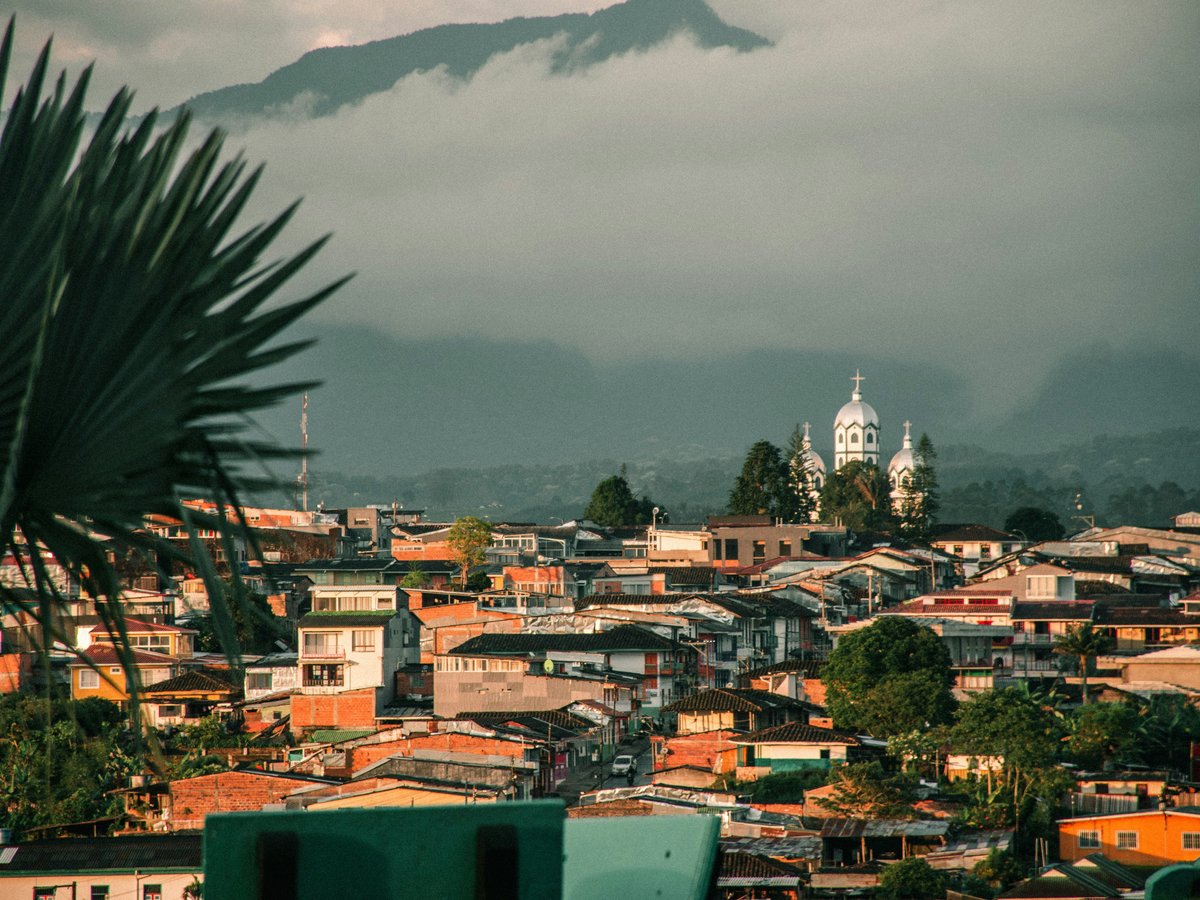 a view of a city with a mountain in the background